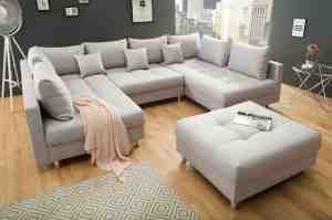 Foto: Hoekbank kent wooneiland beige   hoeksalon met poef hocker u vorm   betaalbare zitbank en sofas   zetelsenbedden